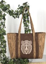 tote bag with embroidery of Celtic knotwork bear on the front panel.