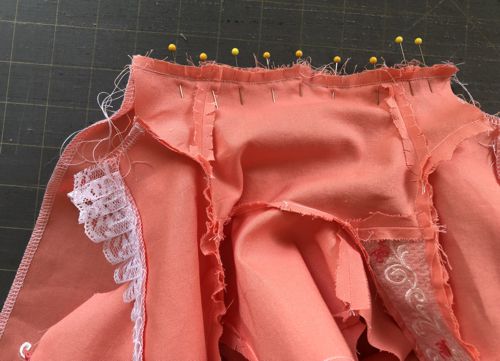 Photo showing how to attach the back part of the skirt to the bodice. View from the side of the bodice.