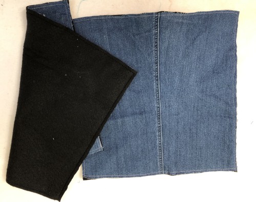 Denim and batting sqaures sewn together along the edges.