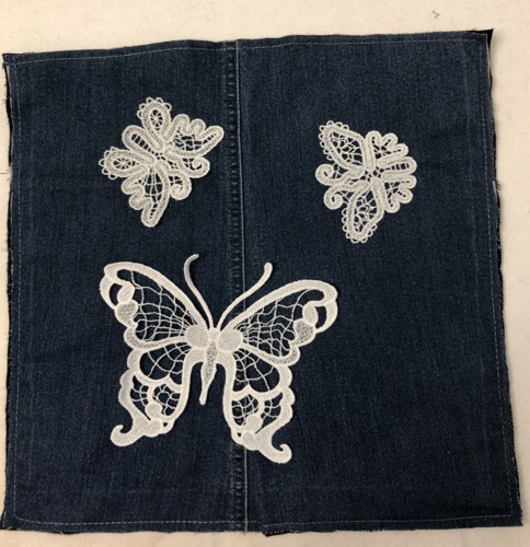 The back panel with the butterfly stitch-outs.