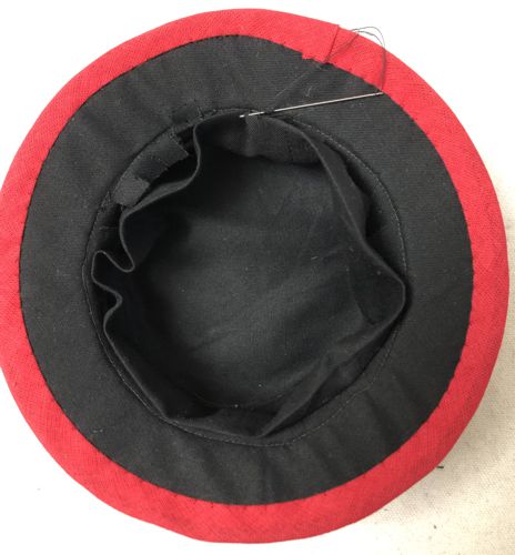 The Lining is stitched into the hat.