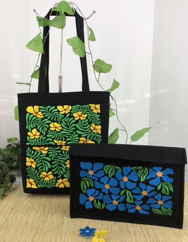 Tote bag abd hand bag with floral panels embroidery.