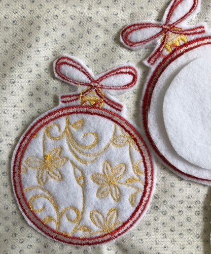 The felt is removed around the embroidery.