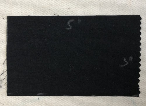 A black strips measuring 3" x 5".