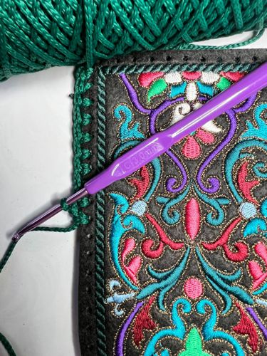 Make a row of single crochet around the panel.