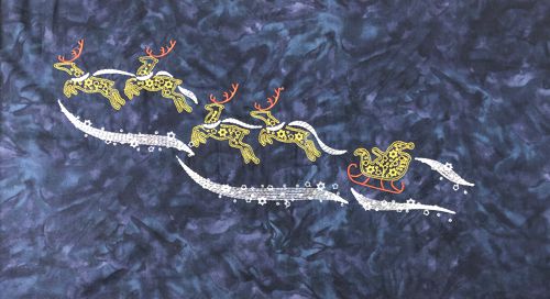 FInished embroidery of Santa's sleigh on a dark blue background