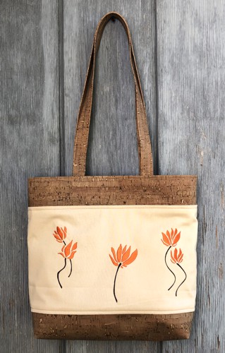 Stylized Flower Bag - canvas embroidered panel framed with cork upper and bottom edges.