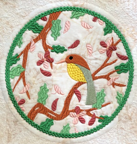 A close up of Spring Window embroidery.